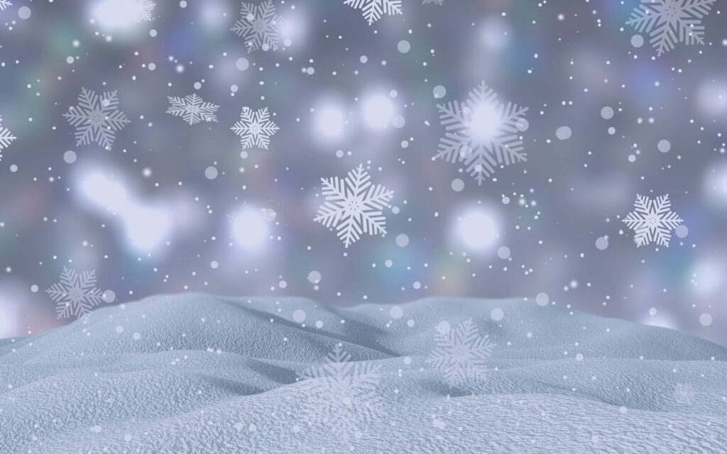 Frosty Elegance: A Captivating QHD Winter Wallpaper with Gentle Snowflakes Dancing on a Blur Background