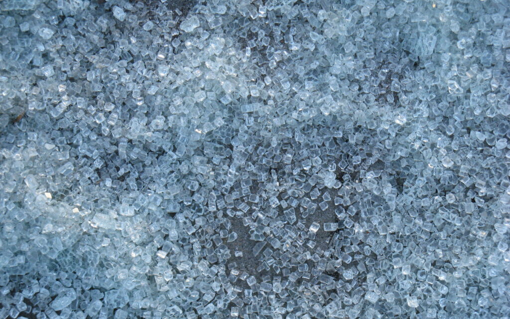 Cooling Crystals: A Close-up Exploration of Icy Textures Wallpaper