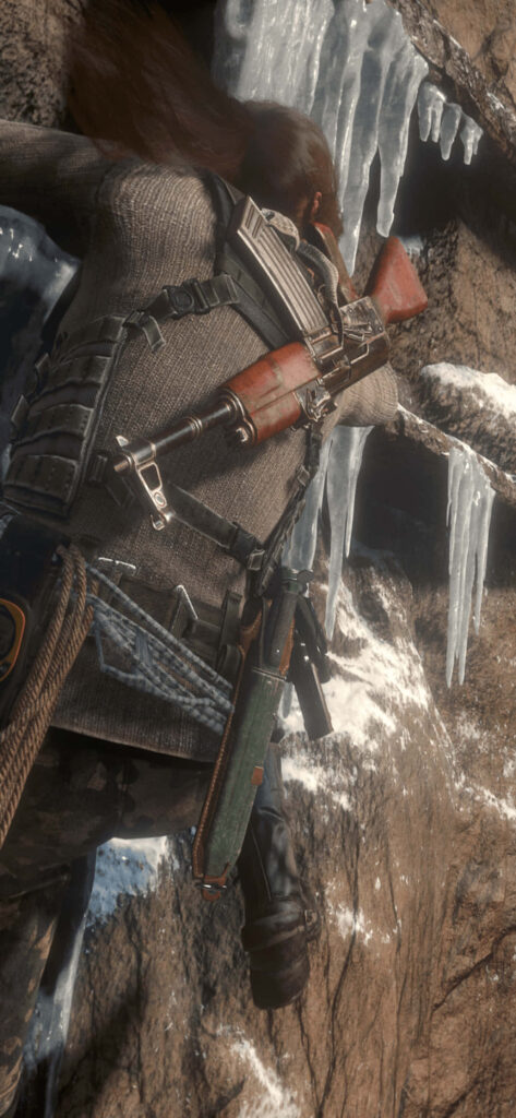 Fearless Explorer: Conquering Perilous Heights in The Rise of the Tomb Raider Wallpaper