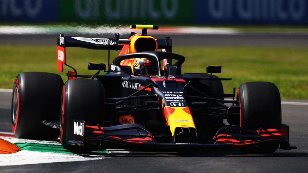 Speed Demon: Alexander Albon Dominating the Track in His Red Bull F1 Machine Wallpaper