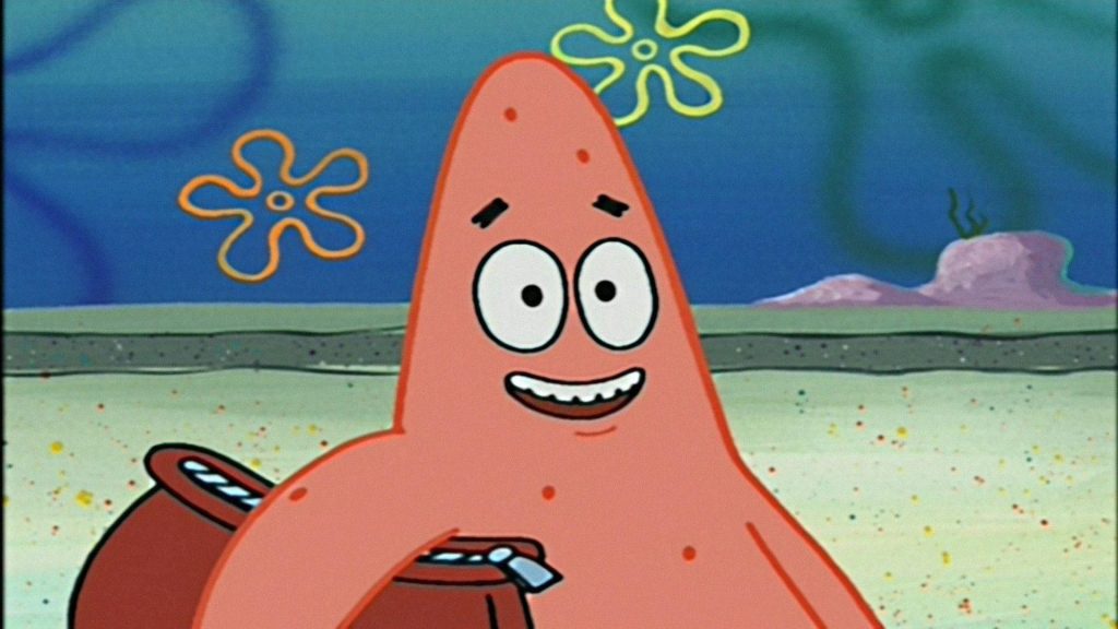 Funny Patrick Star wallpaper SpongeBob cartoon goofy expression holding brown object underwater