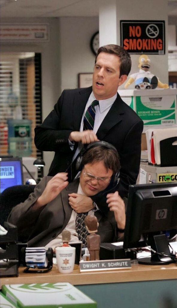 Funny iPhone Wallpaper: Andy & Dwight's Lighthearted Dunder Mifflin Moment