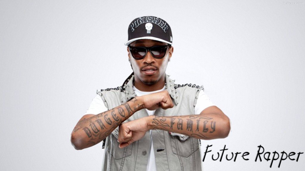 Studio portrait of rapper Future with Punisher cap sunglasses studded vest and Dungeon Family tattoos Wallpaper