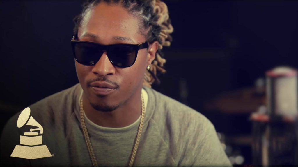 Future rapper wallpaper with dreadlocks sunglasses gold chain dark background Grammy logo
