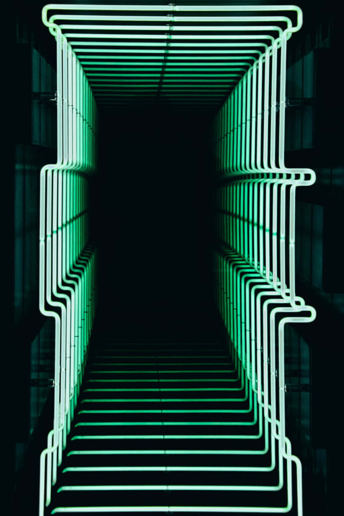 Futuristic 3D Wallpaper: Glowing Green Neon Tunnel Background