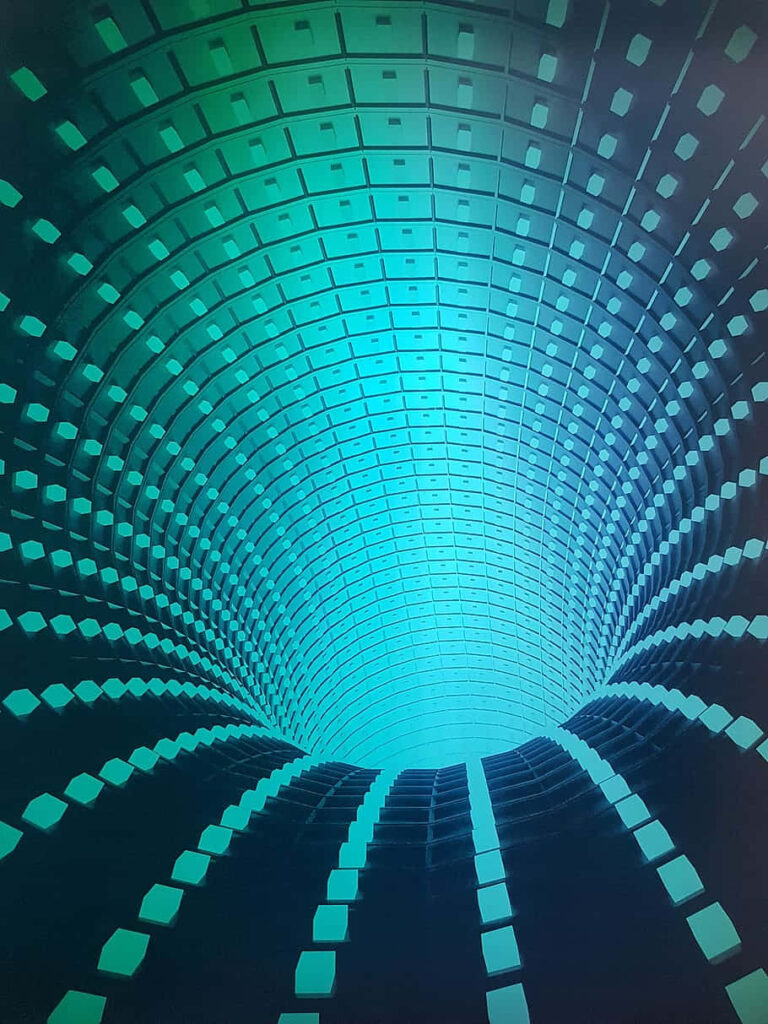 Futuristic 3D Wallpaper: Glowing Blue Cube Vortex Background