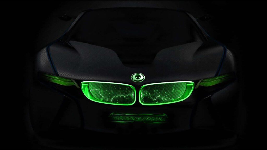 Futuristic high-performance car glowing with vibrant green LED lights inspired by Alienware design Wallpaper