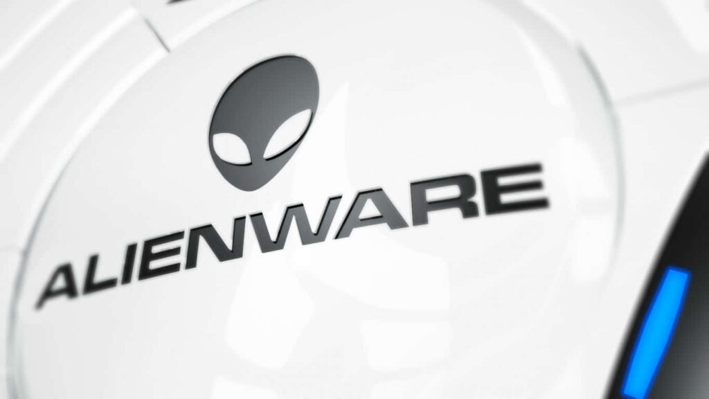 Alienware laptop with futuristic logo against space backdrop stars showcasing power innovation Wallpaper