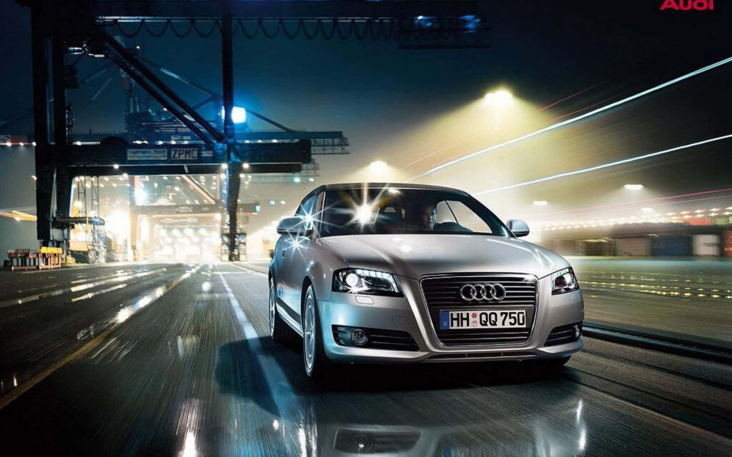 Futuristic Audi concept car with sleek design in vibrant cityscape reflections wallpaper background