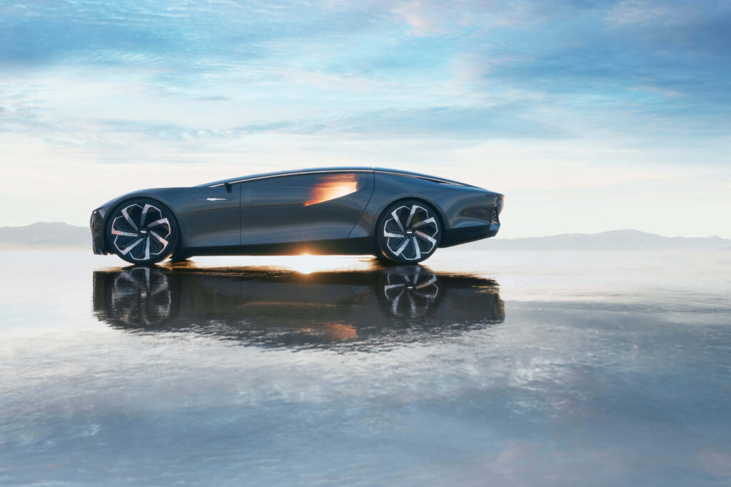 Autonomous vehicle gliding through futuristic cityscape reflecting innovative technology background Wallpaper