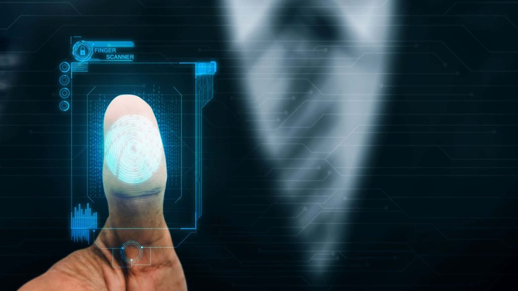 Human thumb using glowing blue biometric fingerprint scanner on dark tech background cybersecurity Wallpaper