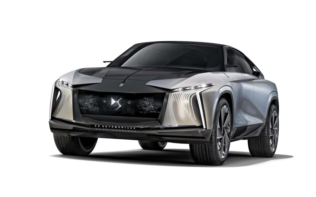 Futuristic DS Automobiles concept car with sleek lines metallic silver black LED lights wallpaper