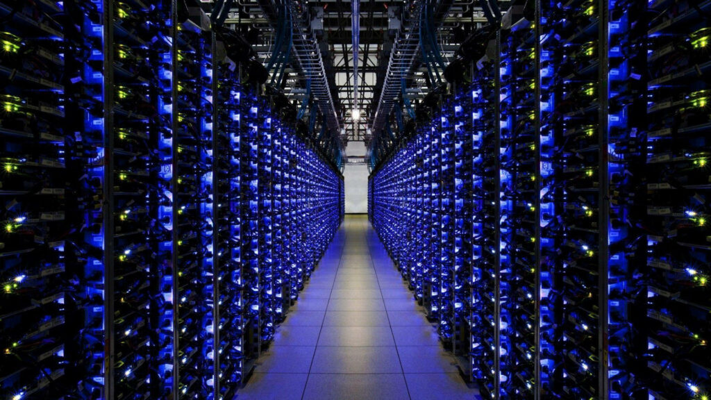 Sleek Futuristic Database Center Wallpaper: Vibrant Blue Server Rows
