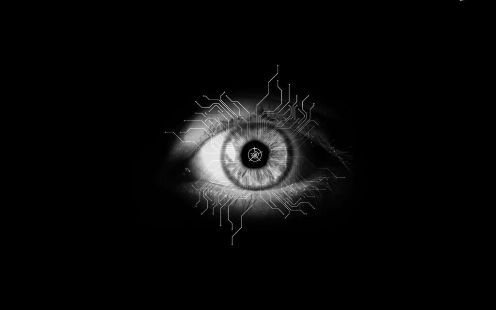 Futuristic Eye Wallpaper: Circuit Patterns on Dark Background