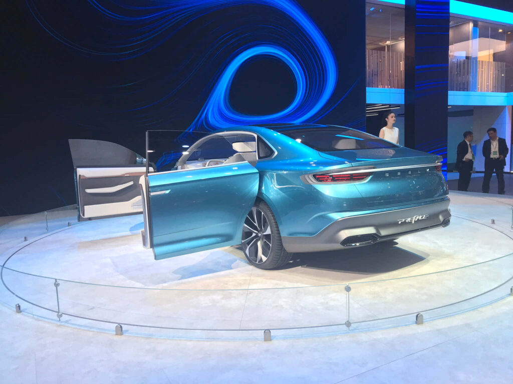 Sleek Geely Preface: Futuristic Elegance in Metallic Blue Wallpaper