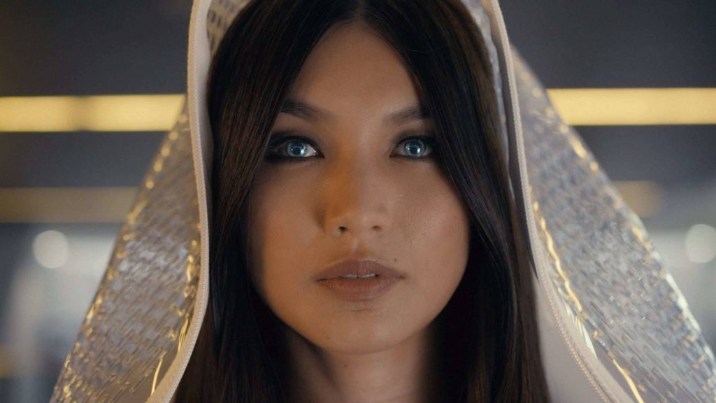 Gemma Chan in metallic hood from sci-fi Humans with piercing blue eyes futuristic portrait wallpaper