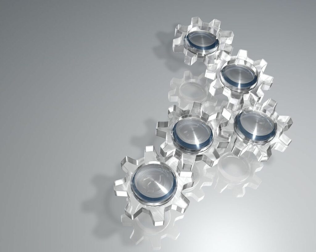 Futuristic Transparent Glass Gears Wallpaper - Intricate Engineering Design