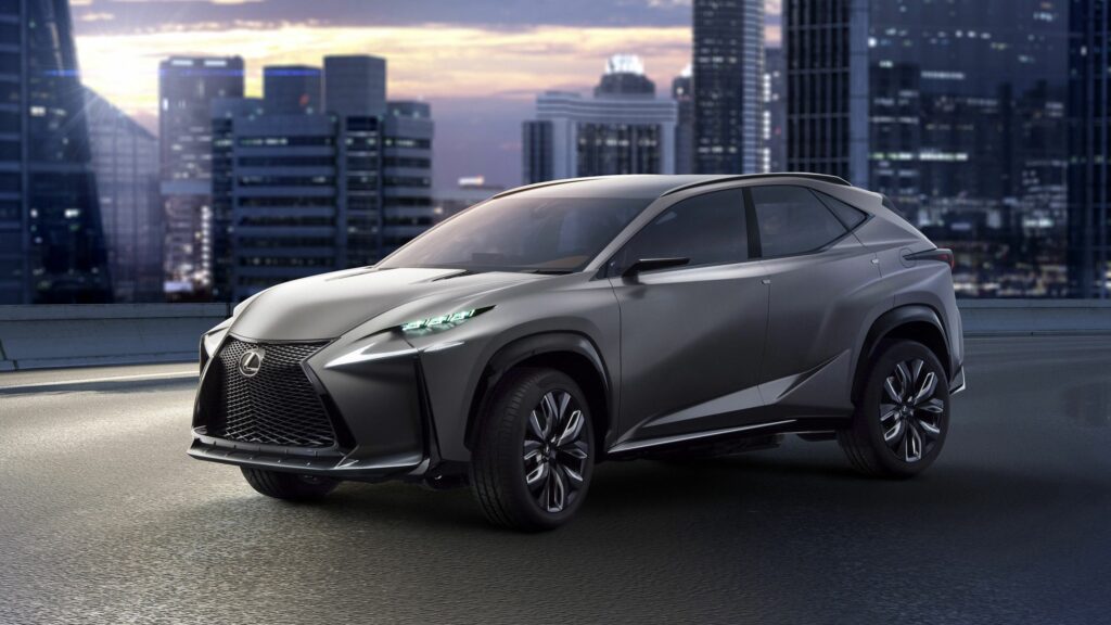 Sleek Gray Lexus LF-NX Wallpaper with Urban Skyline Background