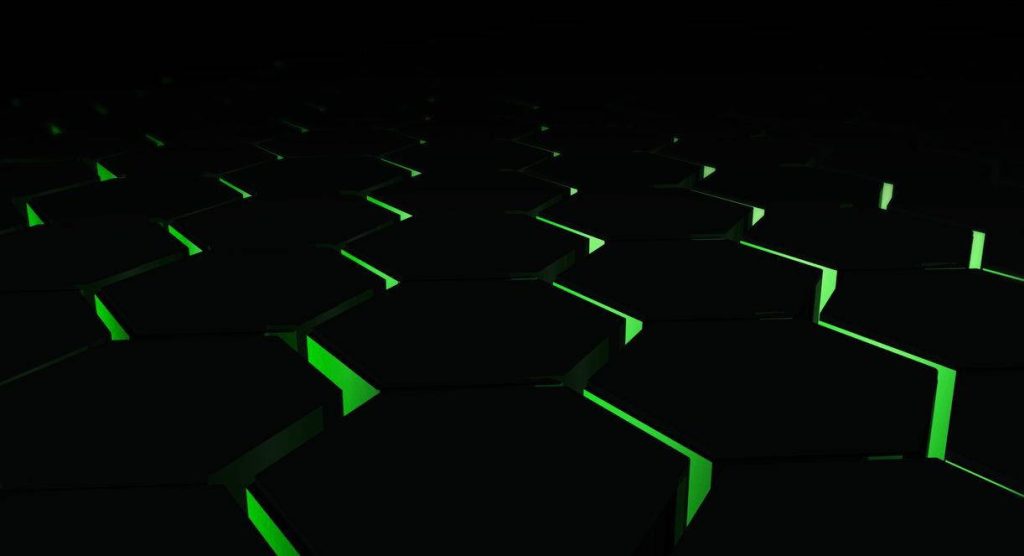 Green neon 3D hexagonal tiles in infinite gaming desktop wallpaper futuristic design background