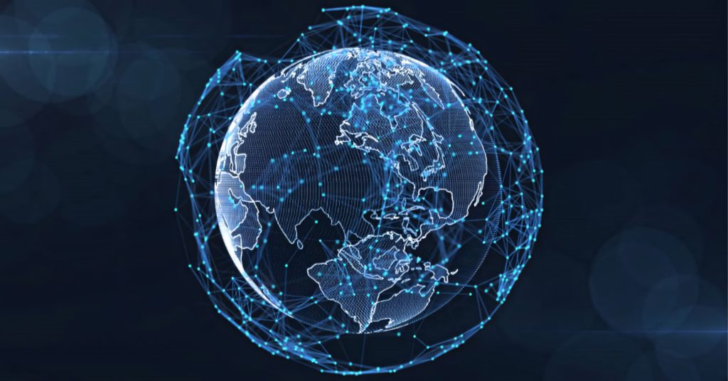 Holographic Earth with glowing network nodes on deep blue background global data connection Wallpaper
