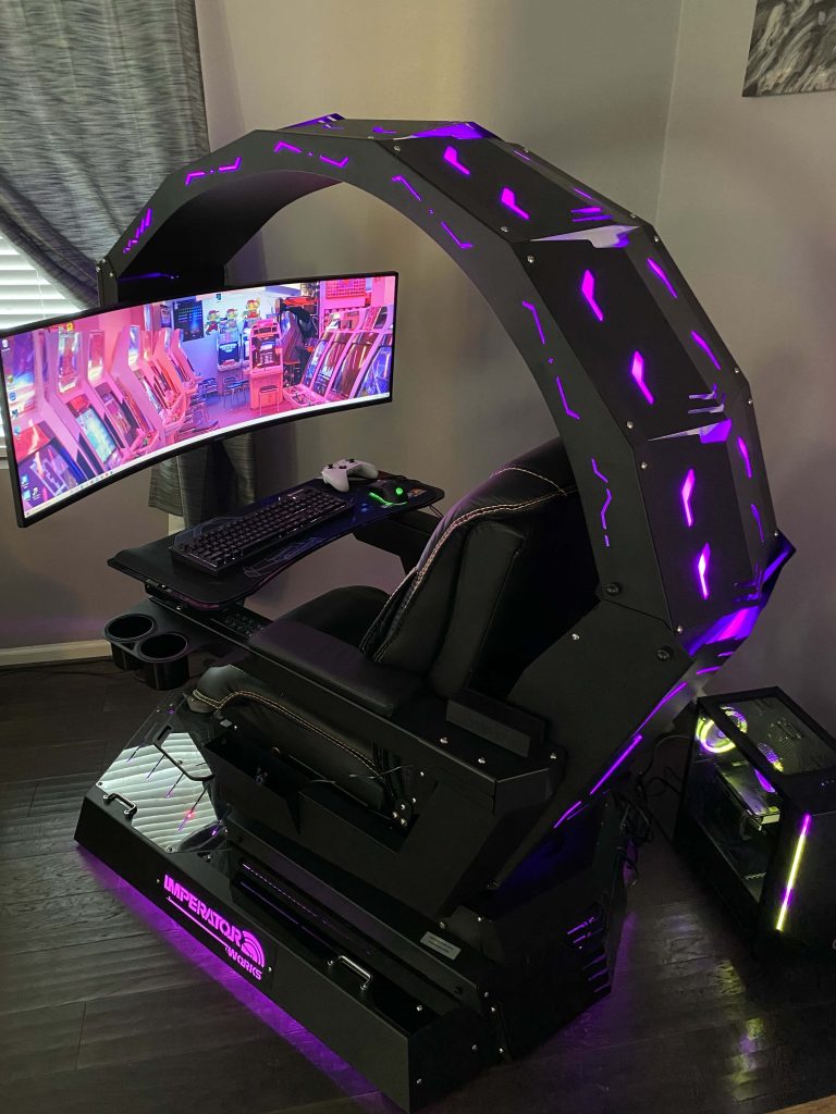 Futuristic Imperator Works Scorpion gaming cockpit with ergonomic chair and purple LED lights Wallpaper