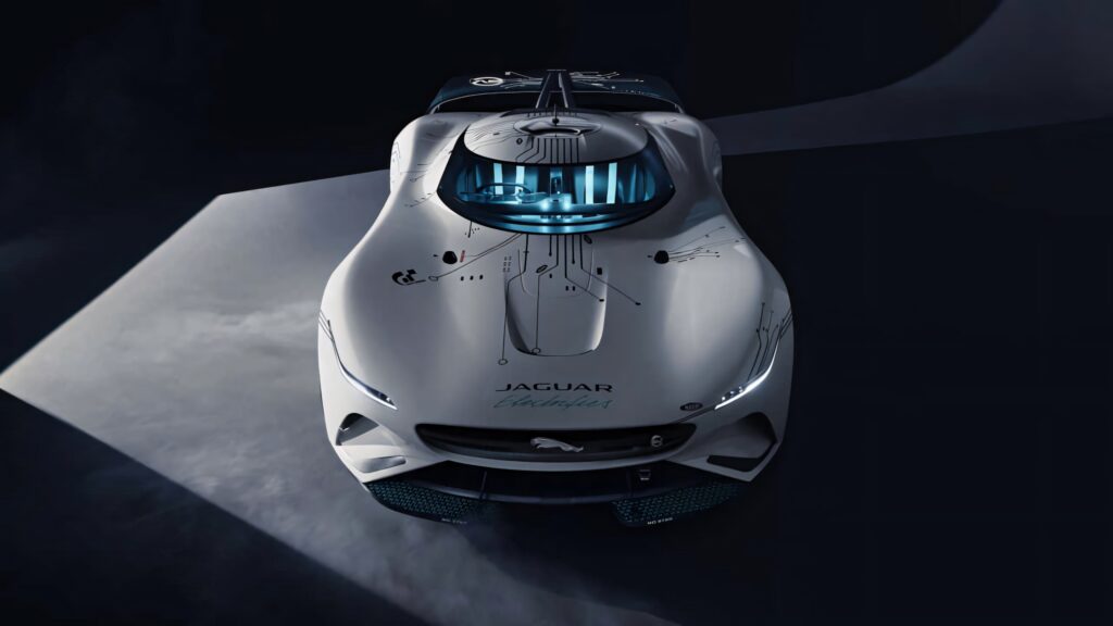 Futuristic white Jaguar electric concept car with sleek curves advanced LED lights and high-tech display Wallpaper