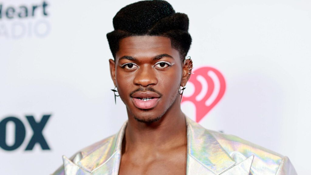 Stylish Lil Nas X Wallpaper: Futuristic Background Radiating Confidence