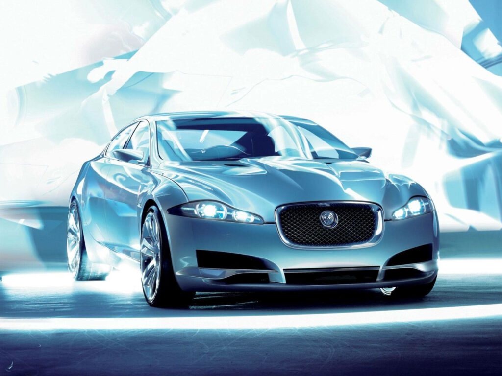 Futuristic Metallic Silver Jaguar Car Wallpaper: Elegance & Power