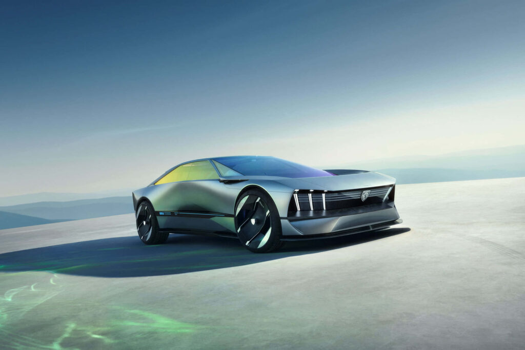 Futuristic metallic sports car with sleek angular design in open minimalist landscape wallpaper