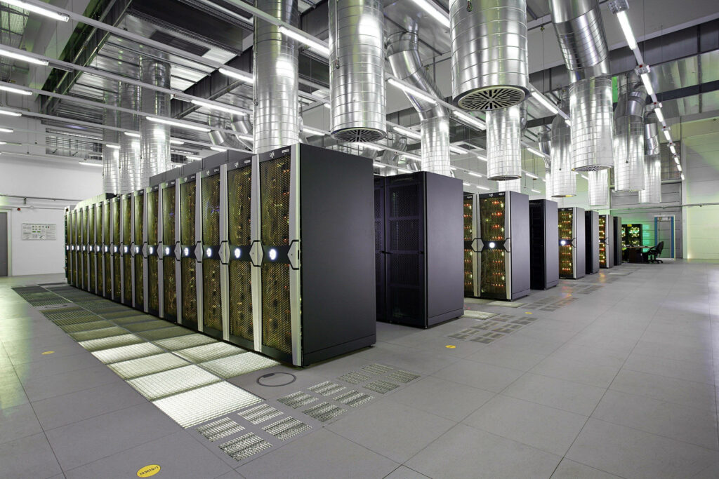 Modern data center with black server racks bright lighting and advanced network technology background Wallpaper