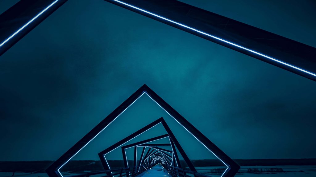 Walterdale Bridge at night glowing with symmetrical teal neon arches futuristic wallpaper background