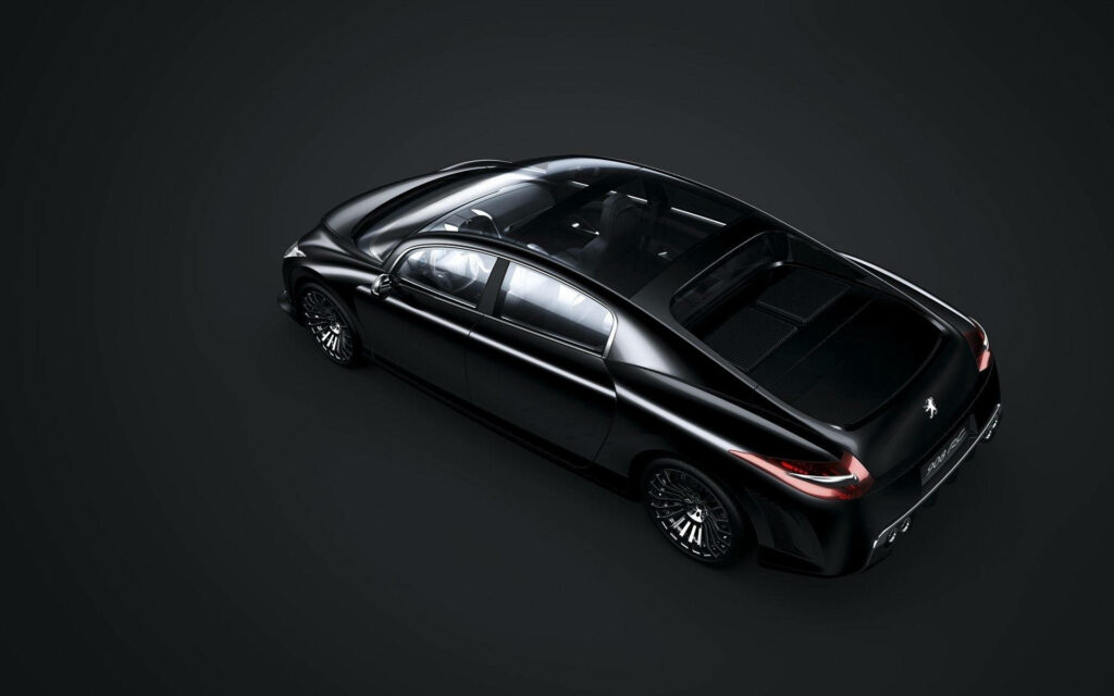 Peugeot 908 RC Wallpaper: Futuristic Design & Glossy Black Elegance