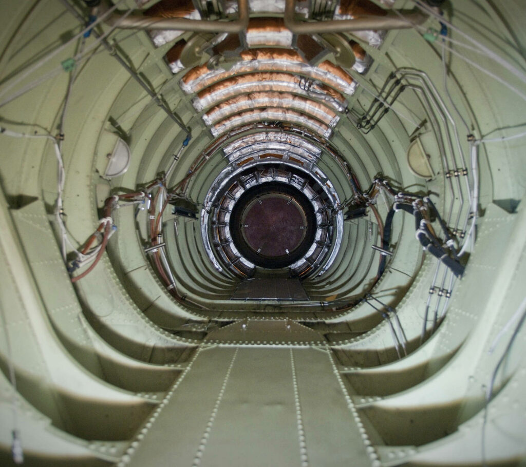 Futuristic NASA-Inspired Space Chamber Wallpaper with Intricate Details