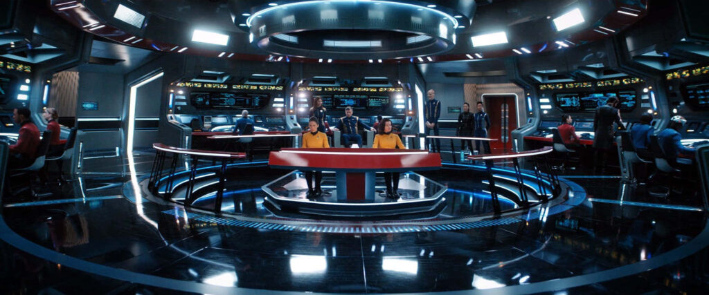 Futuristic USS Enterprise Bridge Wallpaper with Crew in Action