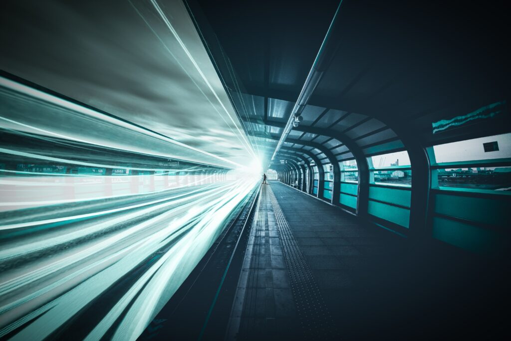 Futuristic Underground Railroad Wallpaper: Illuminated Train Scene