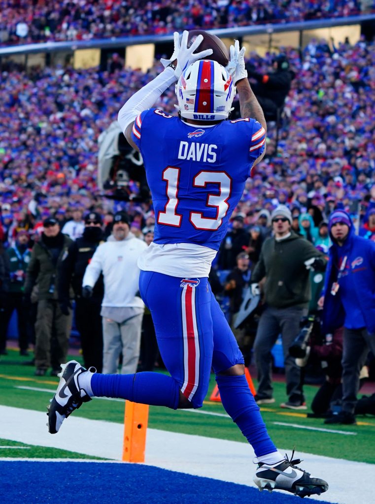 Gabe Davis Buffalo Bills leaping catch action NFL football wallpaper vibrant stadium background