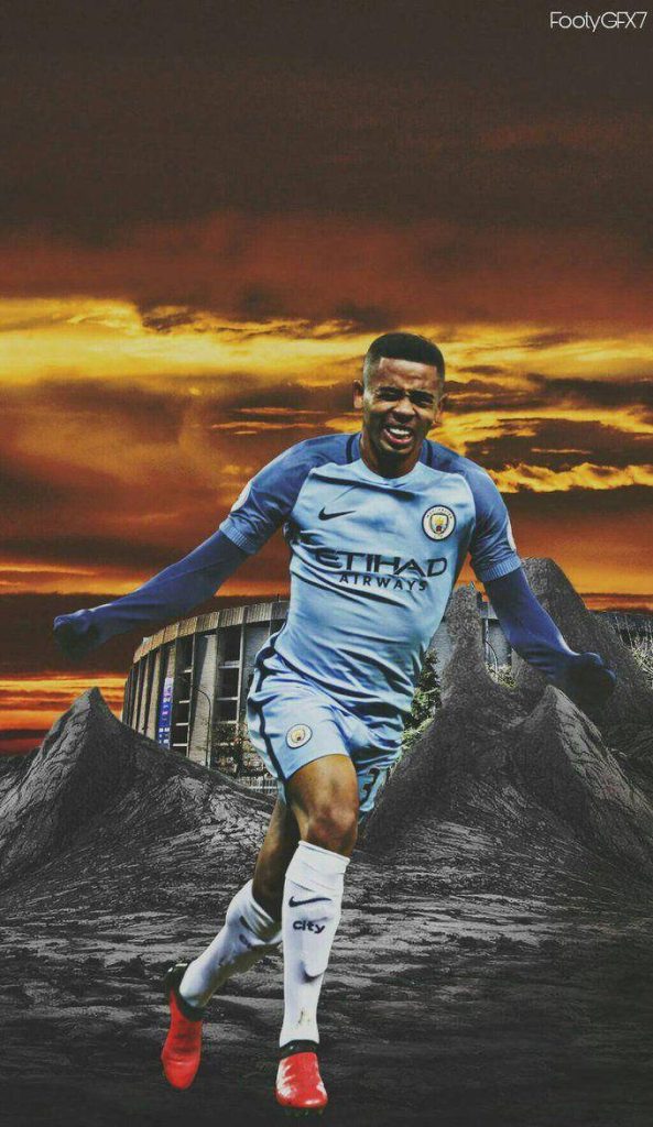 Gabriel Jesus Manchester City celebrating football wallpaper with golden sunset stadium background