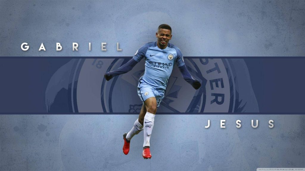 Gabriel Jesus Manchester City kit dynamic football wallpaper blue background club branding