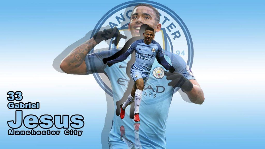 Gabriel Jesus Manchester City wallpaper in sky blue kit with club crest and bold player branding