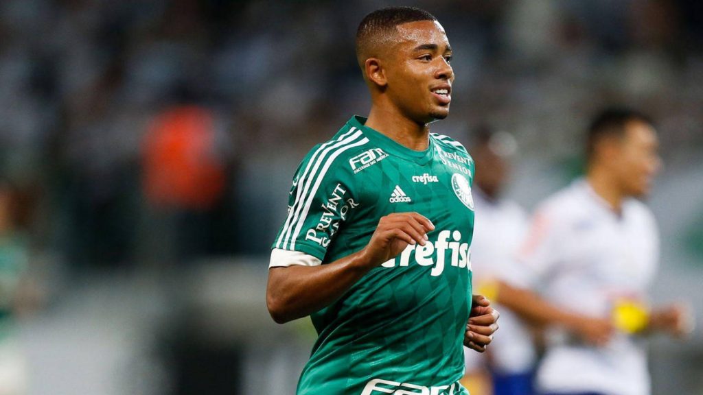 Gabriel Jesus in green Palmeiras kit intense on pitch dynamic football match wallpaper background