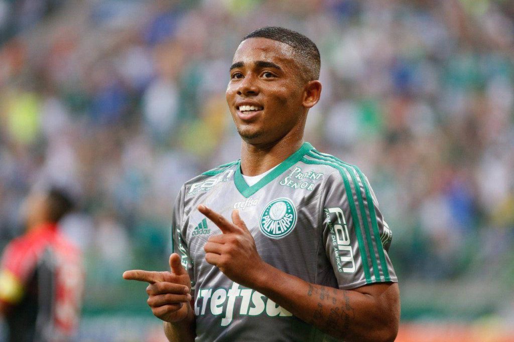 Gabriel Jesus Palmeiras kit celebrates with finger gun pose dynamic football wallpaper background