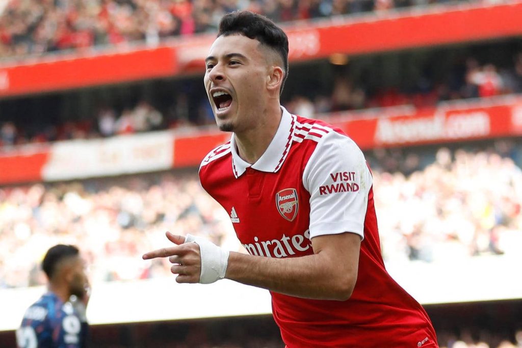 Gabriel Martinelli Arsenal celebration vibrant wallpaper red white kit Gunners fan background