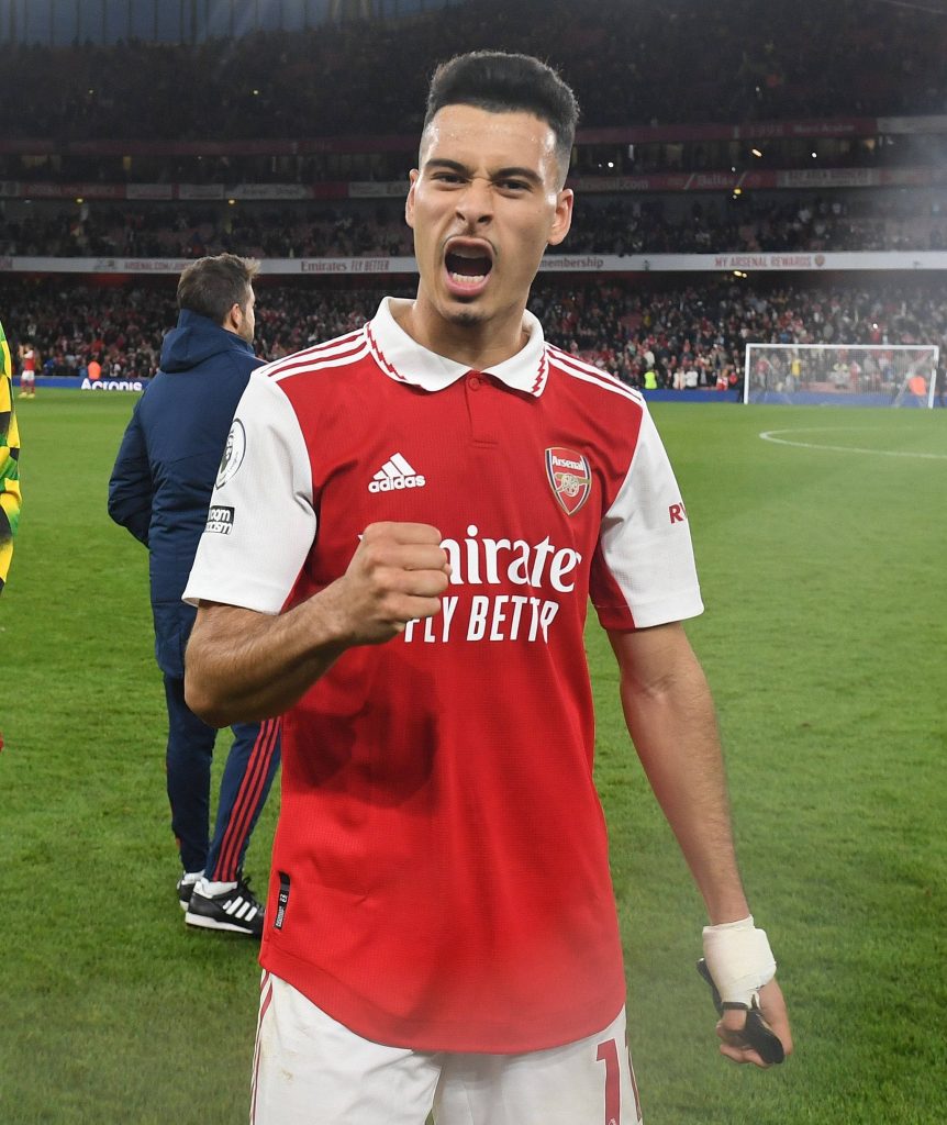 Gabriel Martinelli Arsenal celebration in red kit at Emirates Stadium Premier League football action Wallpaper