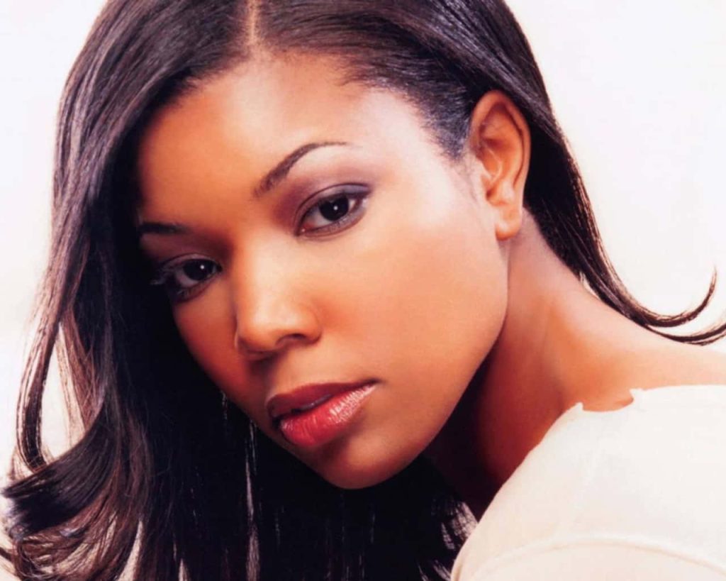 Gabrielle Union close-up portrait wallpaper with soft lighting and bright elegant background