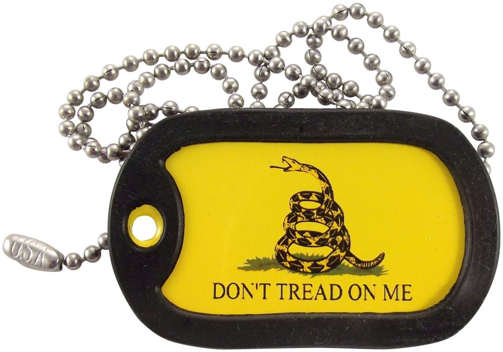 Metal dog tag necklace with yellow Gadsden flag rattlesnake and Dont Tread On Me text on chain Wallpaper