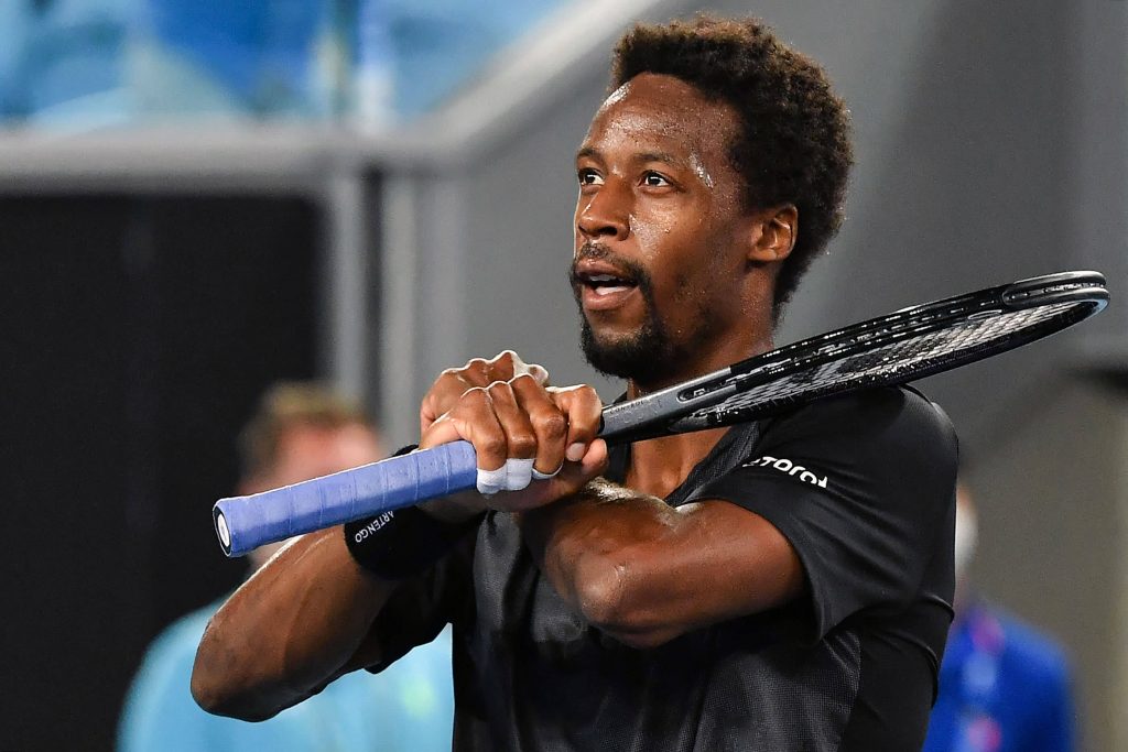 Close-up of Gaël Monfils with focused expression holding tennis racket in intense sports wallpaper