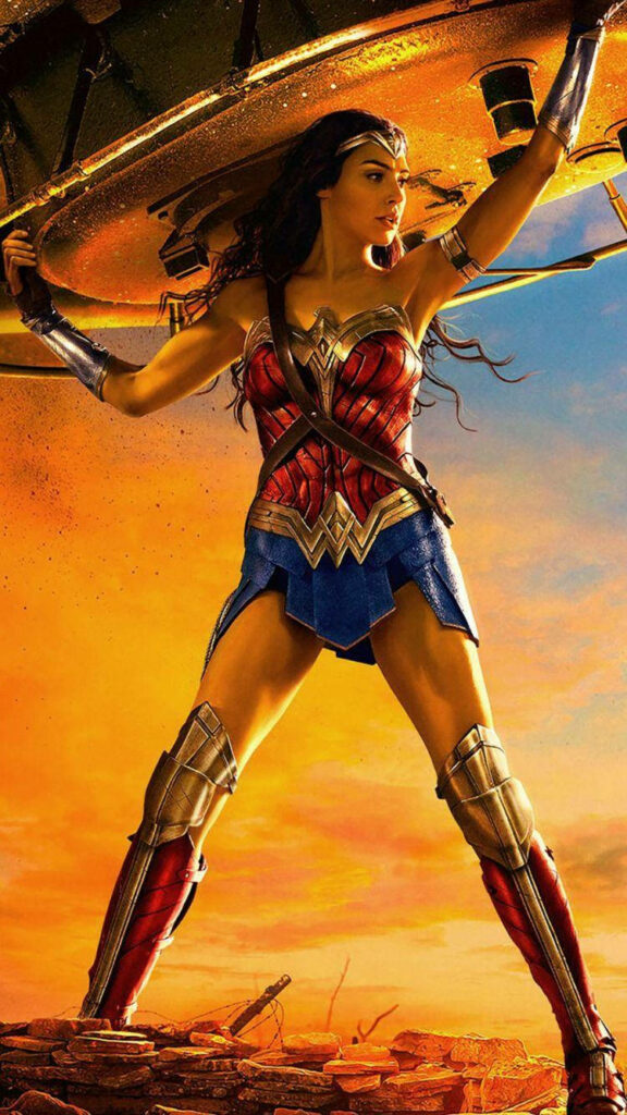 Gal Gadot as Wonder Woman in iconic armor against vibrant sunset superhero iPhone wallpaper background