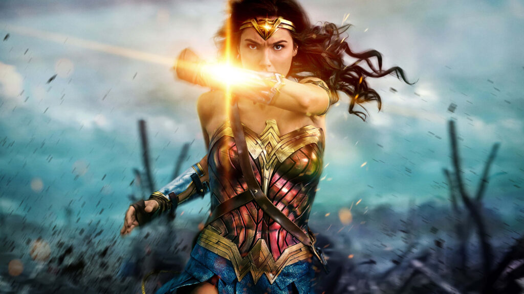Gal Gadot as Wonder Woman charging forward on dramatic battlefield DC Comics wallpaper background