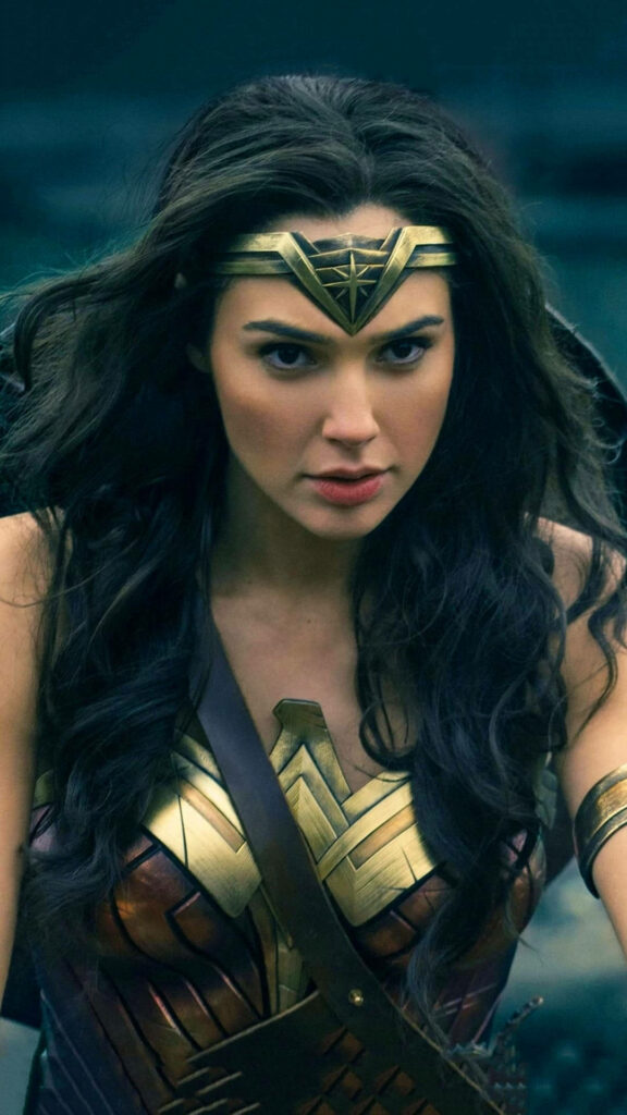 Gal Gadot as Wonder Woman in iconic armor and headpiece dynamic superhero wallpaper background