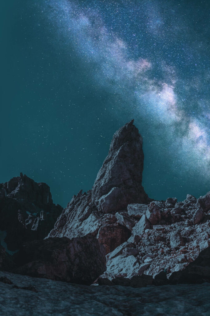 Mysterious Monolith Amidst the Majestic Milky Way: A Captivating Space iPhone Wallpaper